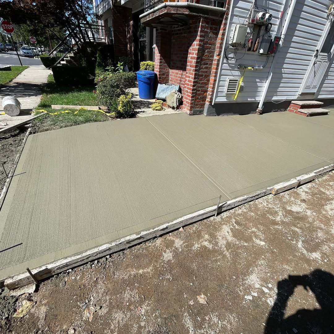 Concrete sidewalk. New concrete sidewalk.
                                        