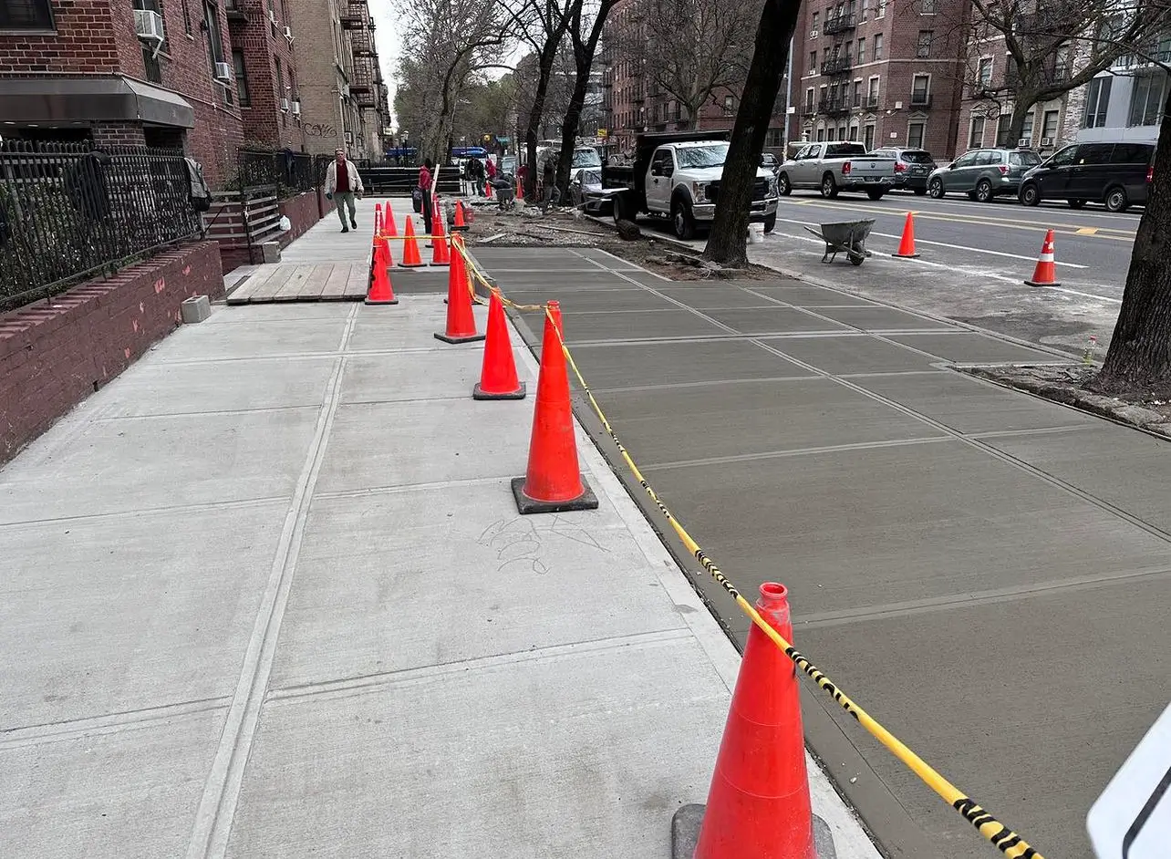 Concrete sidewalk. New concrete sidewalk.
                                        